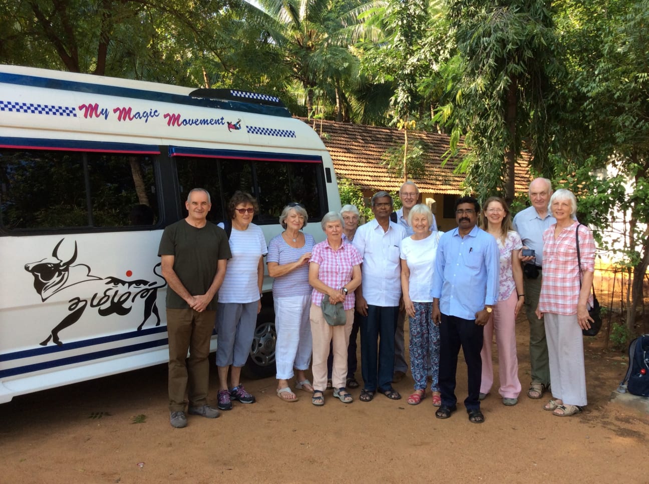 A group from St Andrews Church, Rushmere standing in front of their minibus at RTU